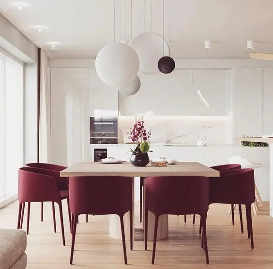 lampa Vibia nad stołem kuchennym