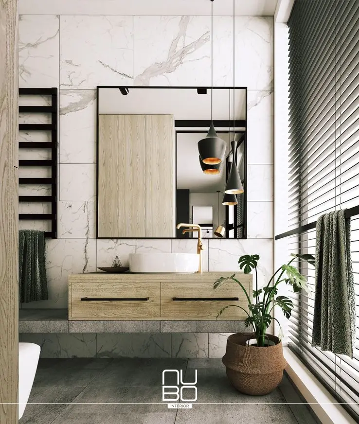 Łazienka w najnowszych trendach, złota armatura przykuwa uwagę