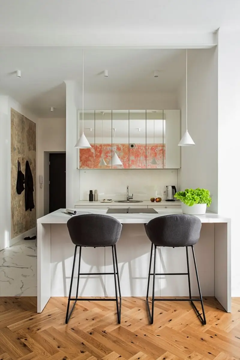 Dekoracja ściany ociepla minimalistyczne wnętrze. | Projekt: Archiwisła, fot. Martyna Rudnicka