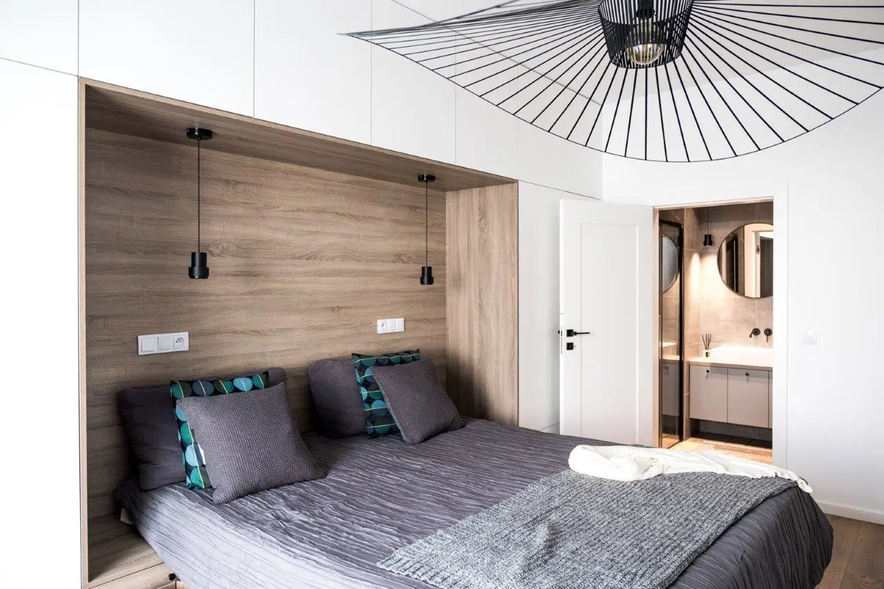 Przytulna i funkcjonalna sypialnia wg projektu Jacka Tryca
