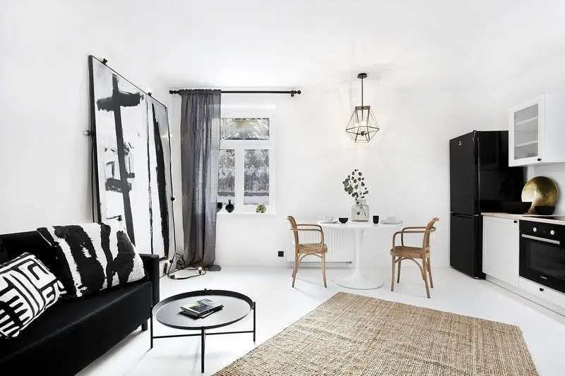 Aranżacja black&white w klimacie boho. | Projekt: studio loko