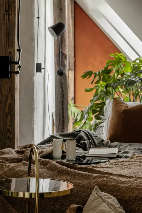 Loft z widokiem na dachy kamienic i PKiN