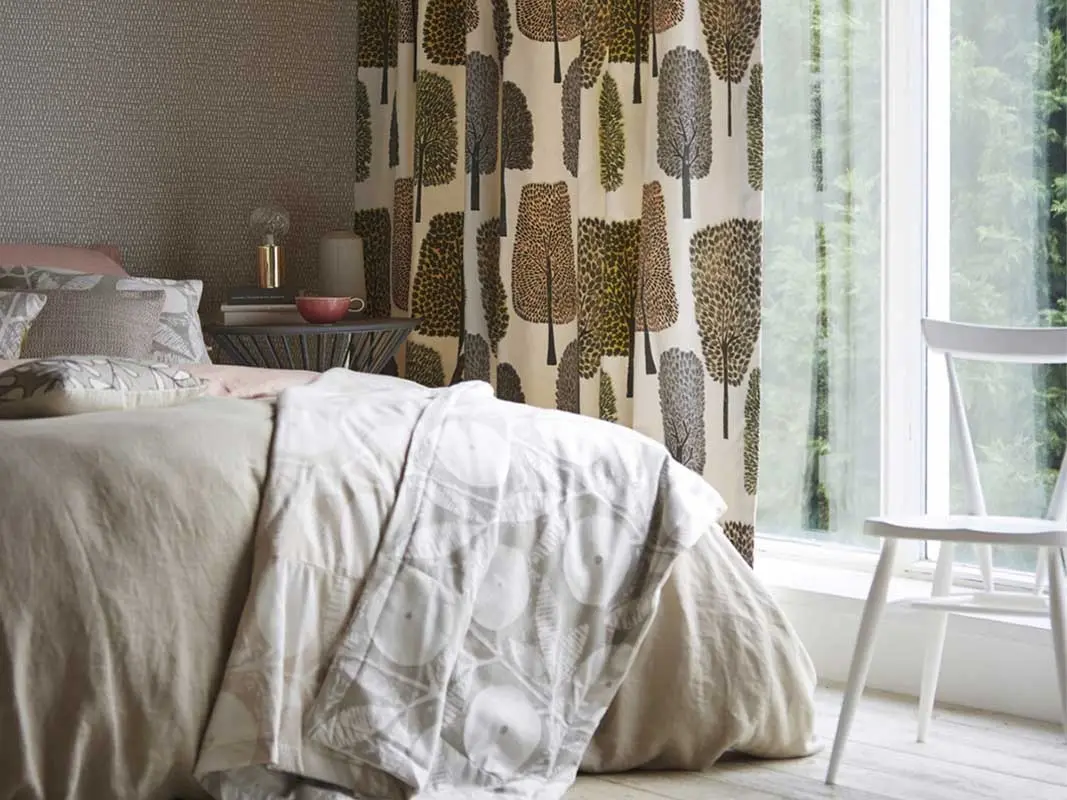 Tkaniny marki Harlequin ze skandynawskimi wzorami.