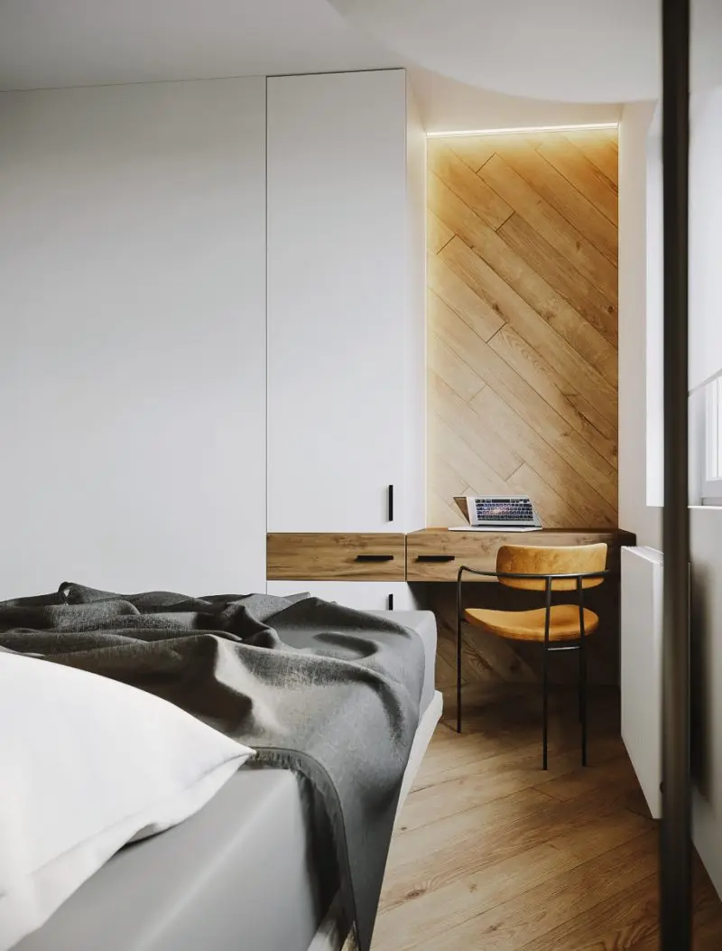 Wąska nisza została wykorzystana do zorganizowania strefy home office. | Proj.: we’re architects