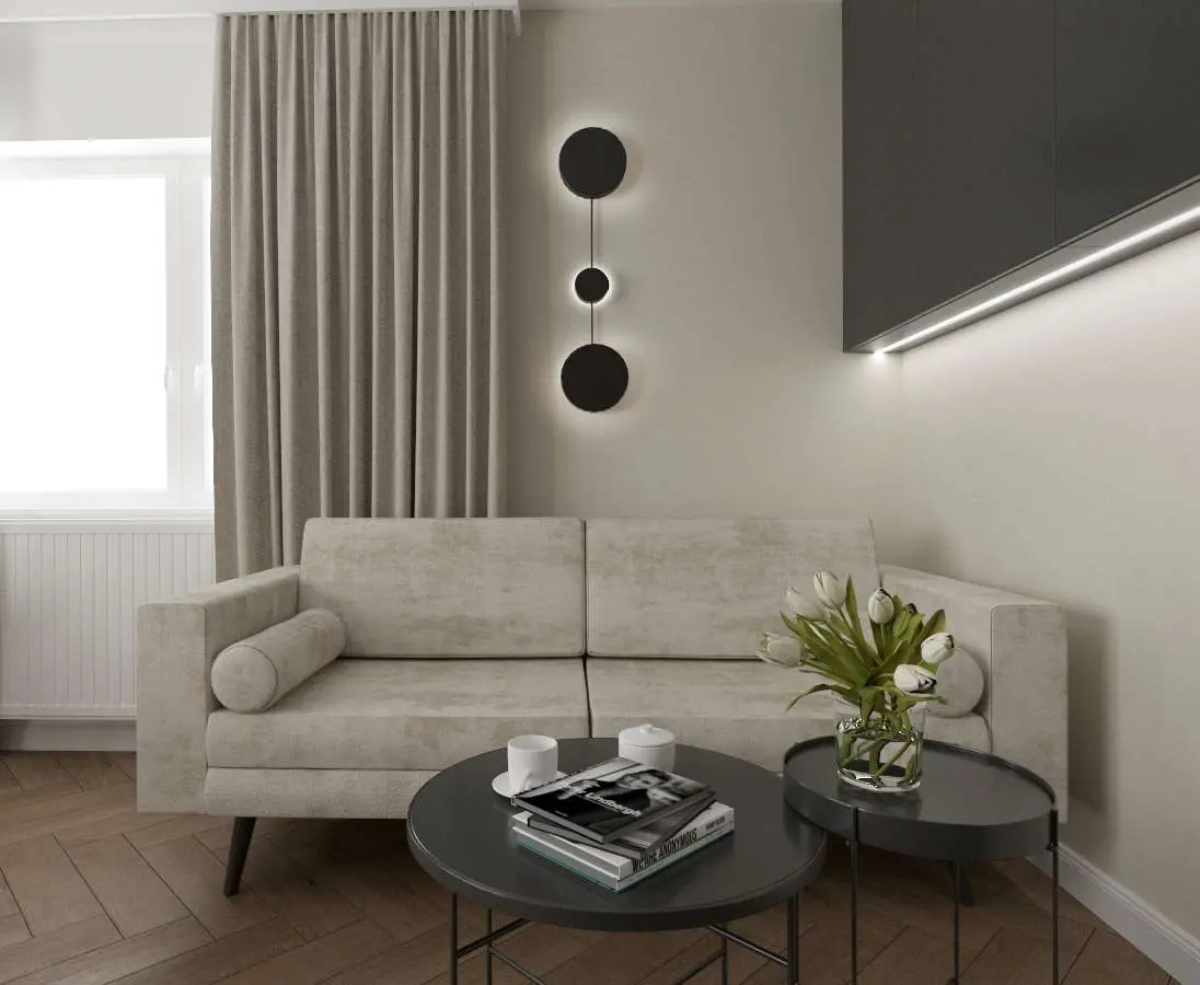 Beżowo-szara sofa w salonie